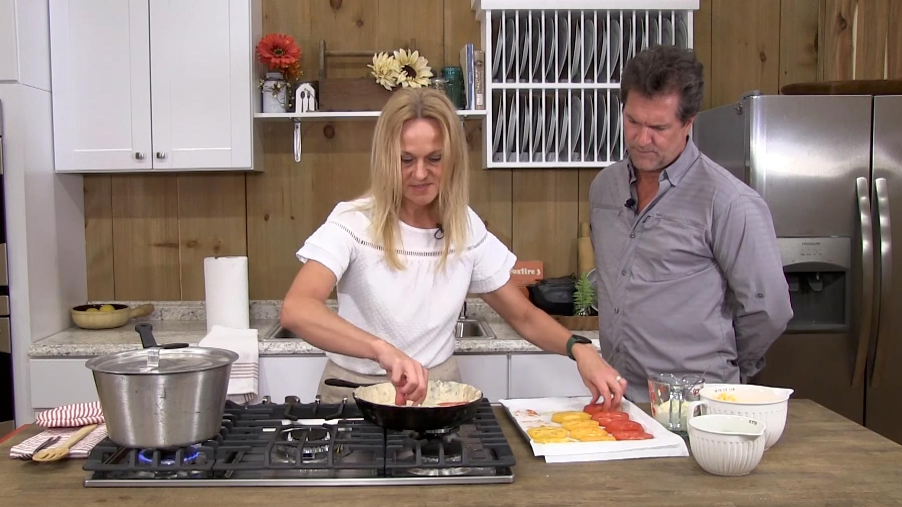 Stephanie Foley and Tim Farmer in the kitchen on an episode of Tim Farmer's country kitchen.